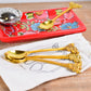 Brass Spoons With Bees